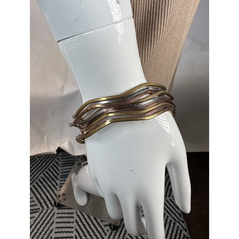 Set Of 9 Wavy Mixed Metal Bangles In Gold Copper & Silver Finish